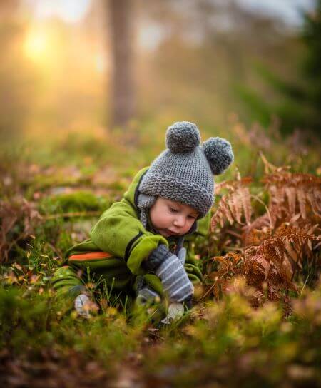 Child playing the grass